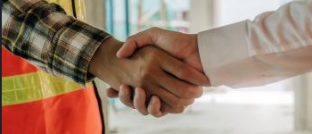 Image of two arms shaking hands